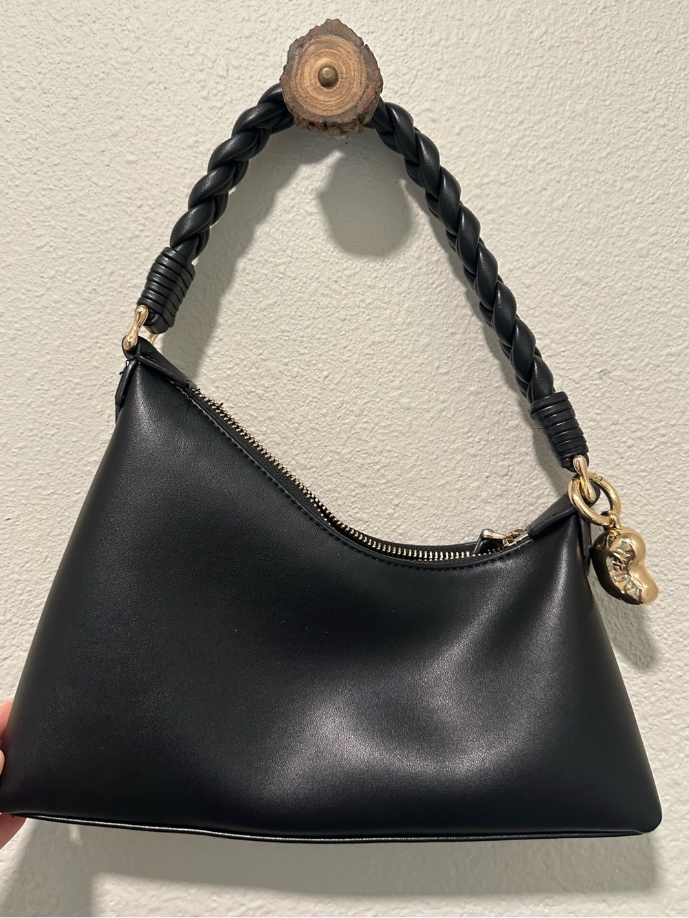 Structured Black Shoulder Bag with Braided Handle and Gold Accents